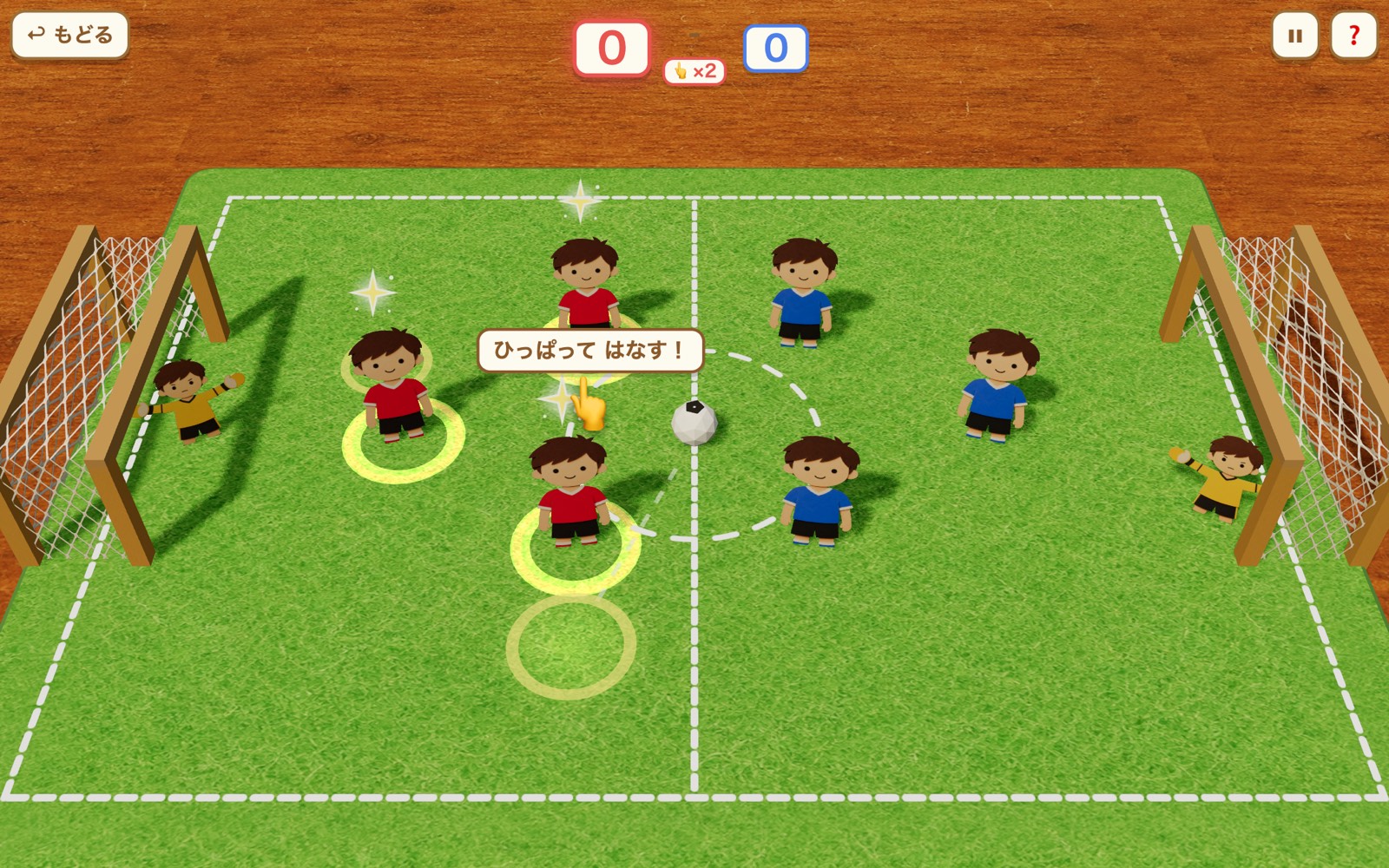 ペタサッカー — 木の机の上の紙工作フィールド